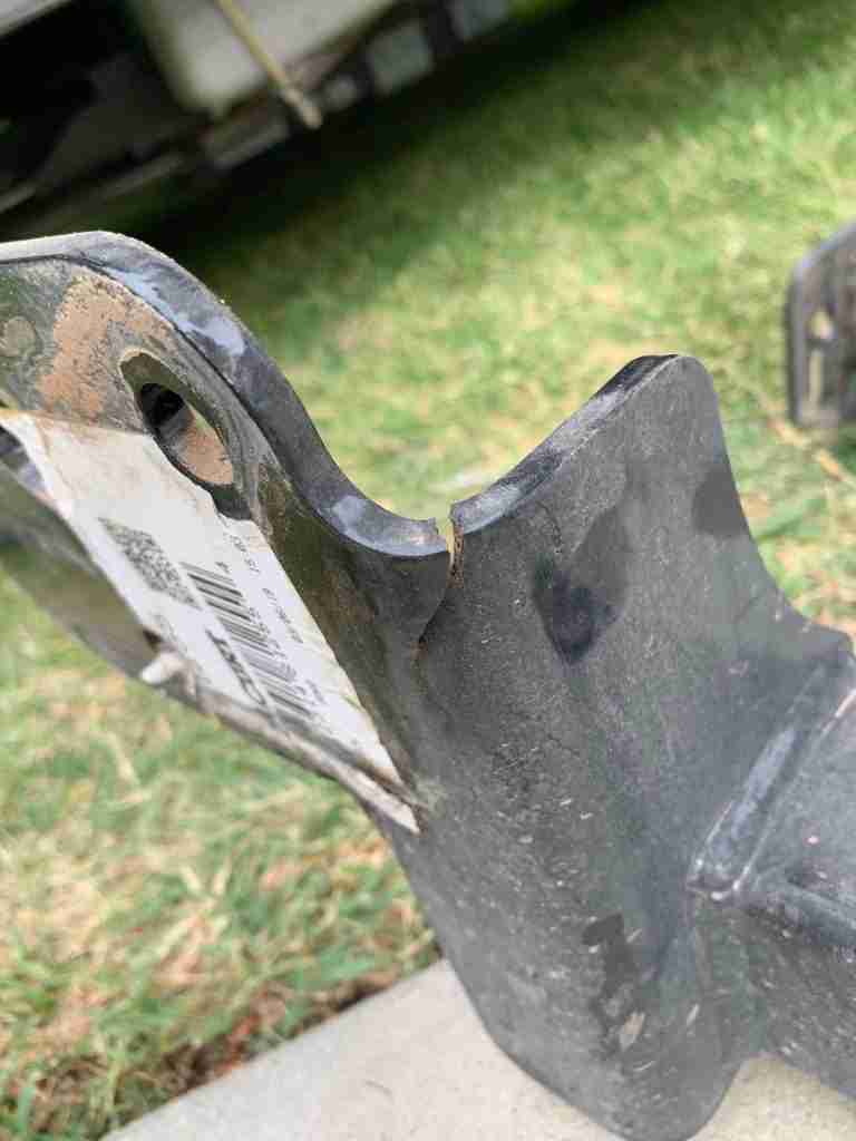 Cracked rear metal tow htich