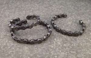 Bike chain bracelet // Help reduce waste and support small businesses by choosing upcycled bicycle gifts that repurpose old bike chains, inner tubes, tires, and more