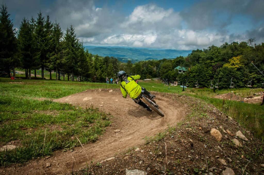 Mountain biker on bermed trail at Beech Mountain Bike Park in North Carolina