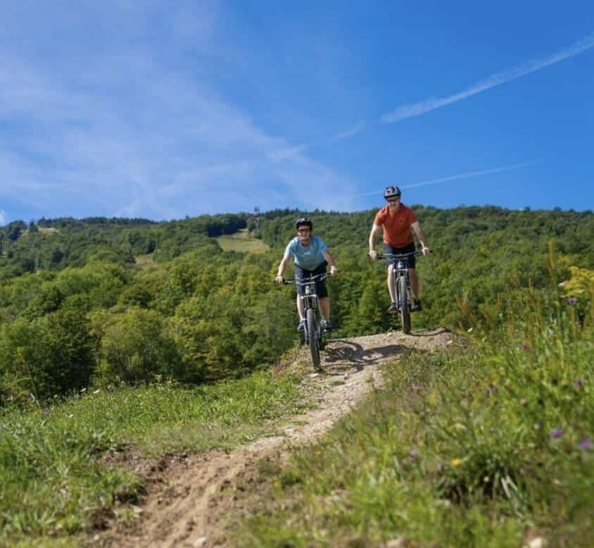mountain bikers on trail at Okemo Bike Park in Vermont
