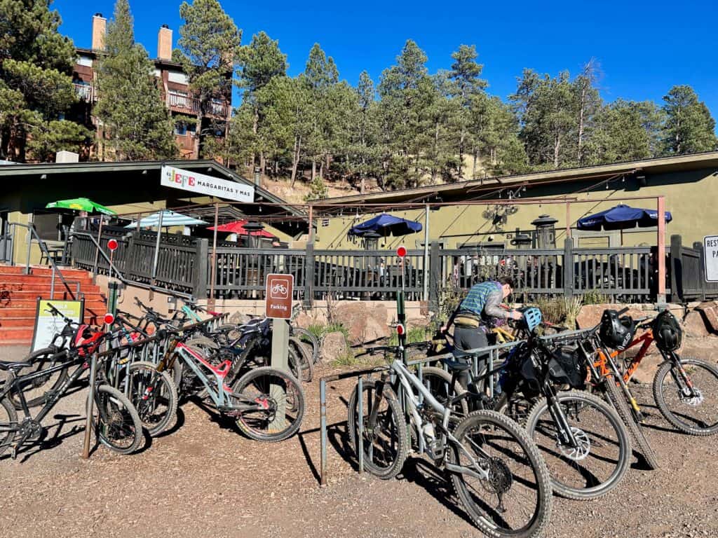 Mountain bikes parked outside restaurant