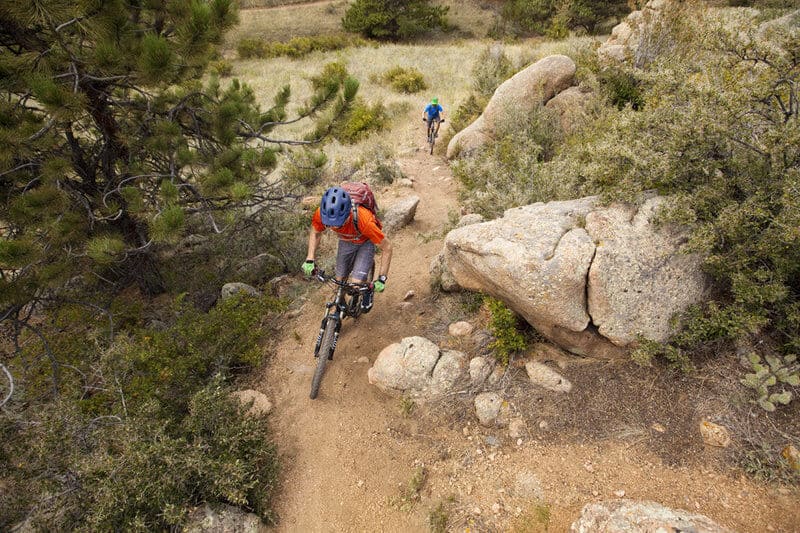 Mountain bikers on singletrack trails in Curt Gowdy State Park in Wyoming