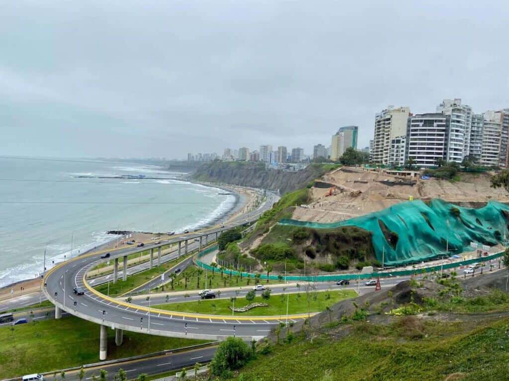 View of Lima's waterfront cliffs with highway and skyscrapers