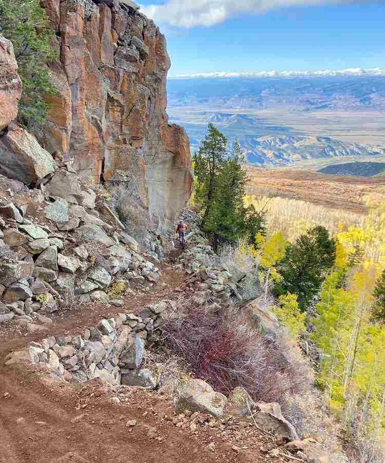 Learn everything you need to know about mountain biking the Palisade Plunge trail in Colorado including shuttles, maps, trail tips, and more.
