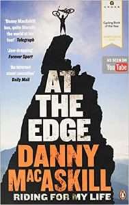 At The Edge by Danny MacAskill // Discover the best mountain biking books to fuel your adventure from coffee table reads, autobiographies, adventure stores, and more!