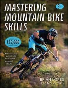 Mastering Mountain Bike Skills by Brian Lopes // Discover the best mountain biking books to fuel your adventure from coffee table reads, autobiographies, adventure stores, and more!