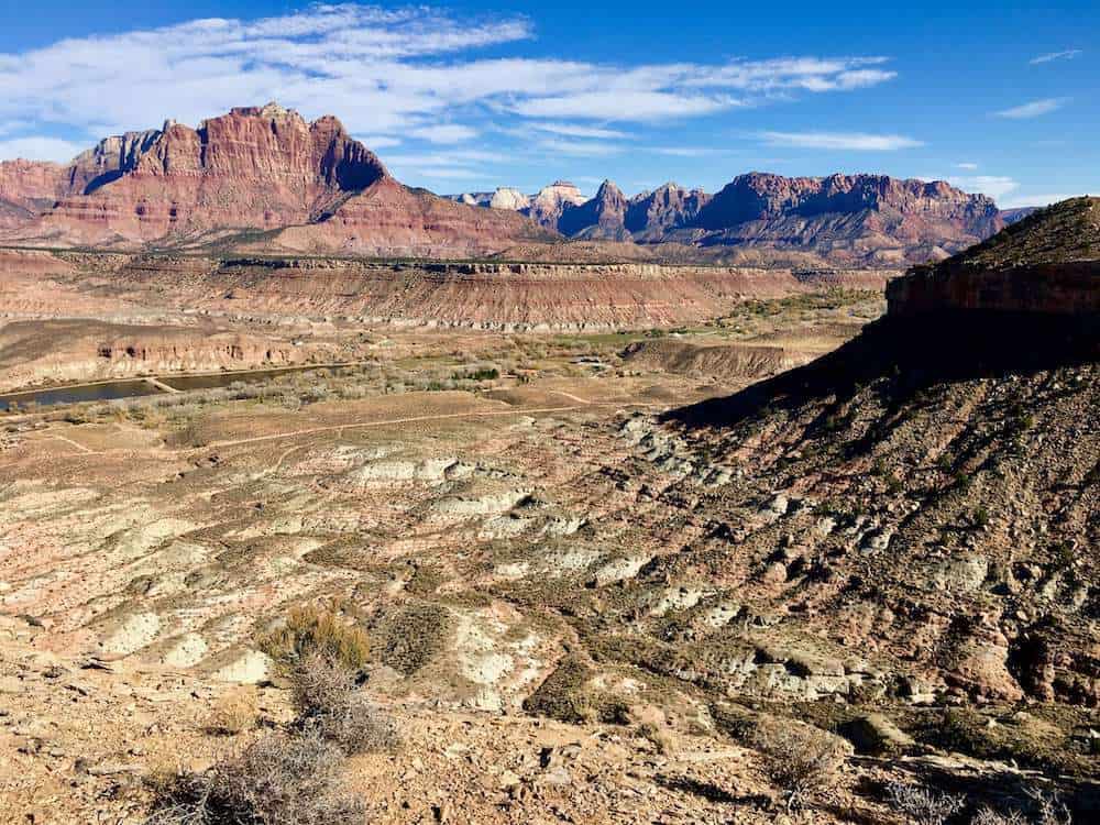 Views out over red rock valley and cliffs outside of Zion National Park in Utah