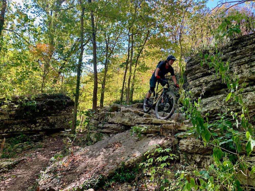 Becky riding on natural rock band in Bentonville, Arkansas