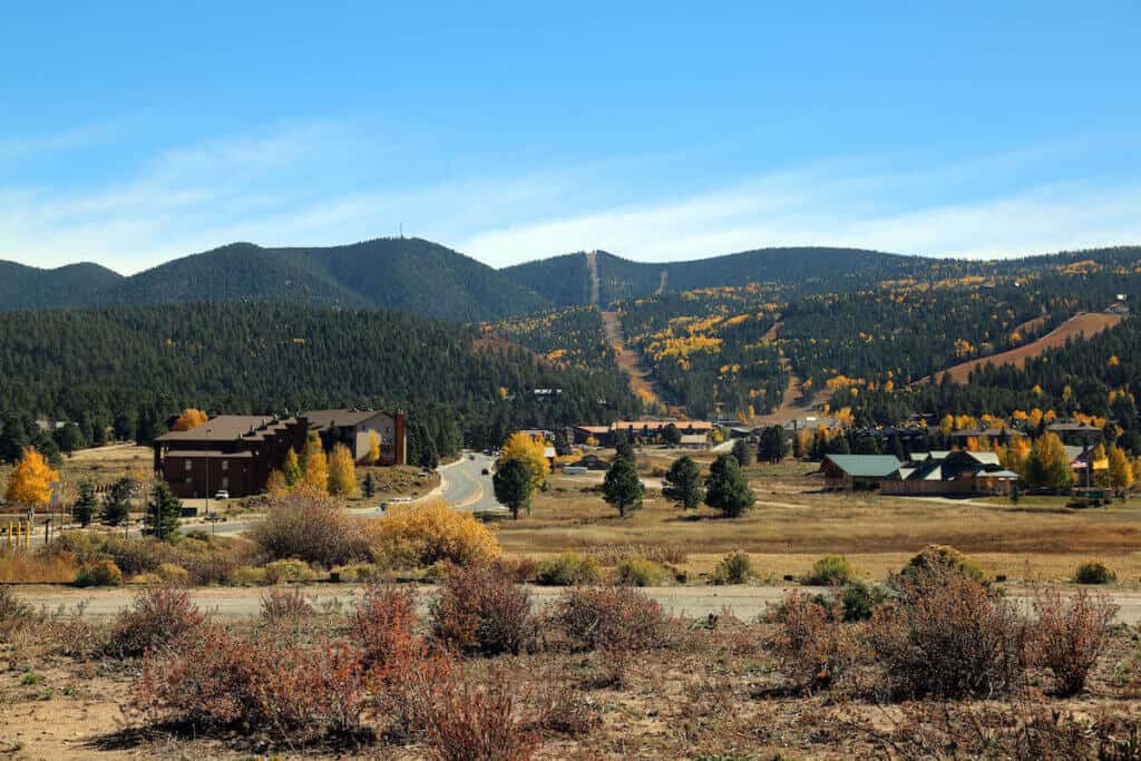 Angel Fire ski and mountain bike resort in New Mexico surrounded by changing aspen trees
