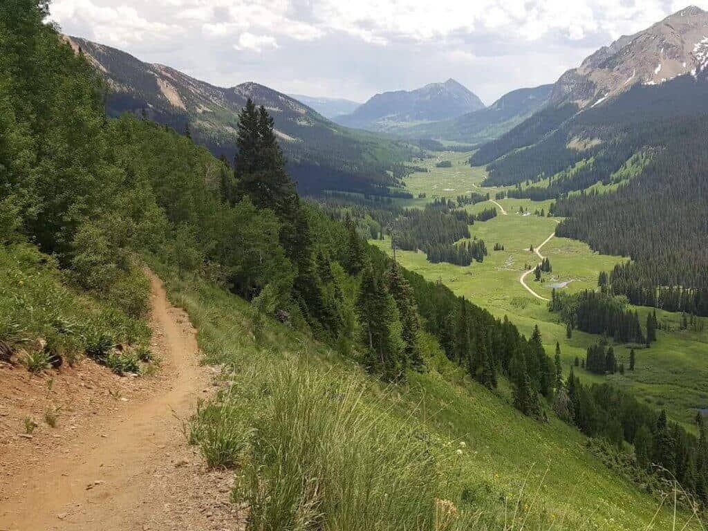 Stunning view of Colorado valley near Crested Butte from singletrack mountain biking trail