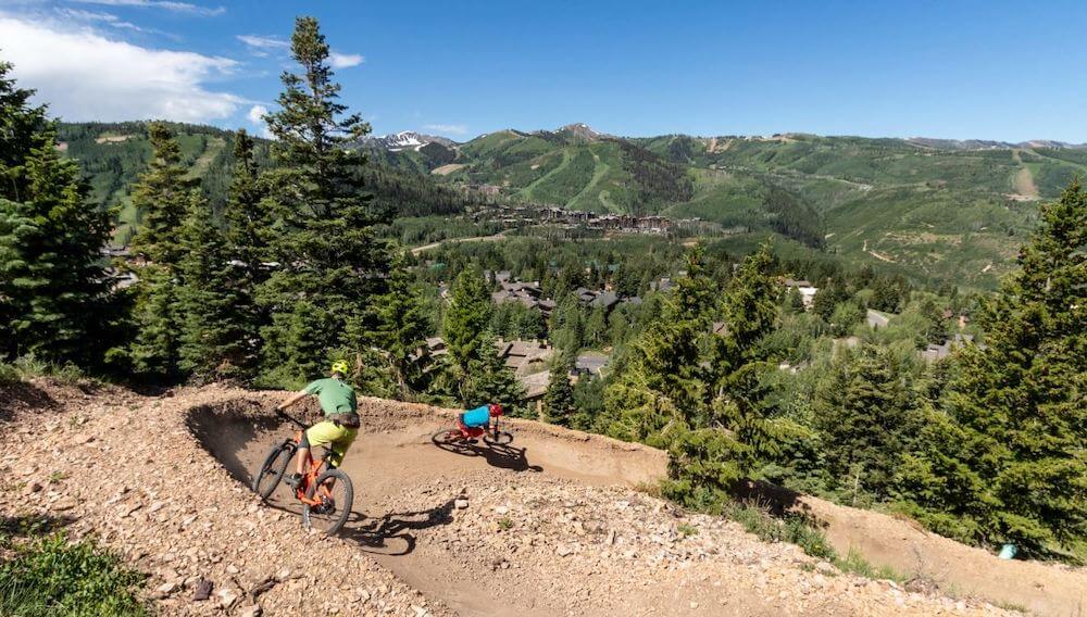 Mountain bikers on flow trail at Deer Valley Bike Park in Utah