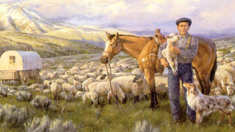Painted mural of Basque Sheepherder with flock of sheep and horse. Painted by Lori Drew and located in Ely, Nevada