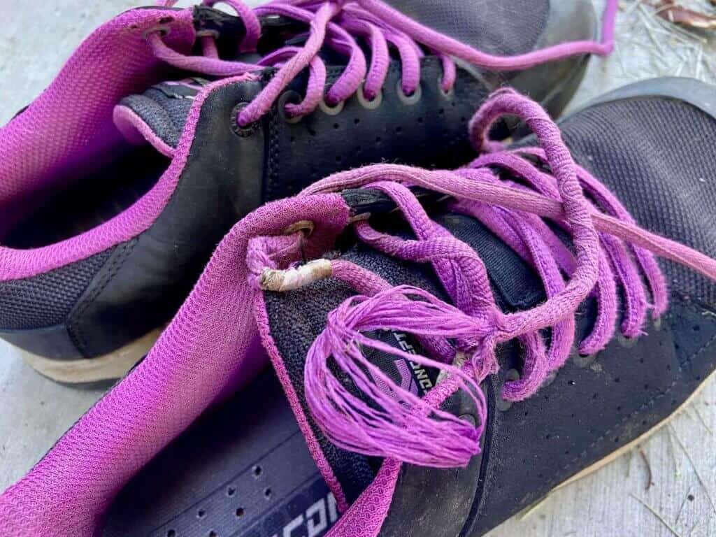 Frayed shoe laces on mountain bike shoes