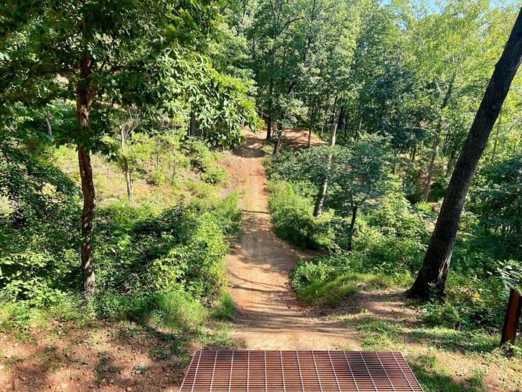 View from top of 12+ foot Drop The Hammer feature at Coler Preserve in Bentonville Arkansas