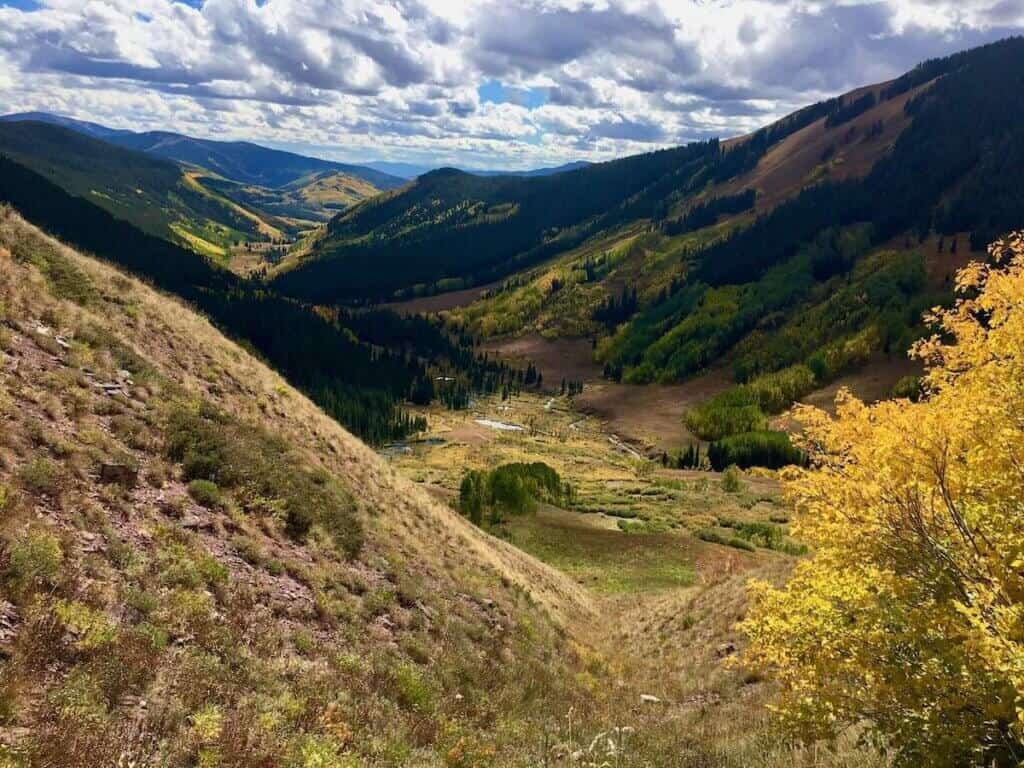 Views out over beautiful valley with changing aspens leaves in Colorado
