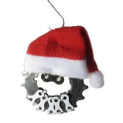 Santa face made out of recycled bicycle parts with red and white had