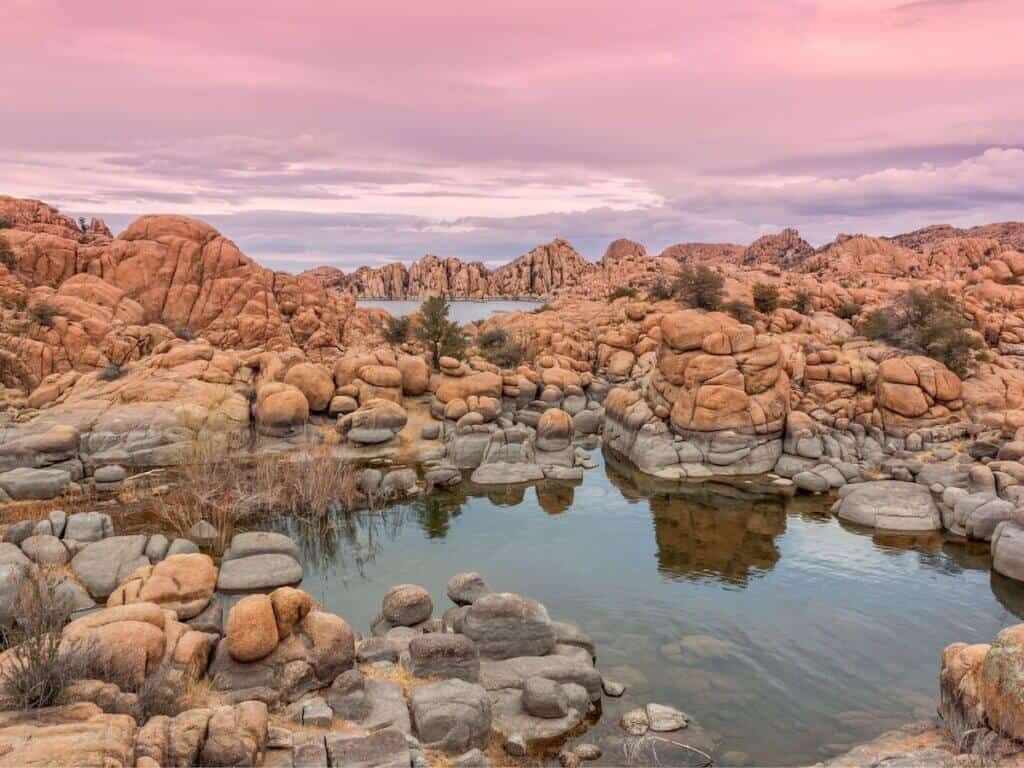 Sunset views over rock formations on Watson Lake in Prescott, Arizona