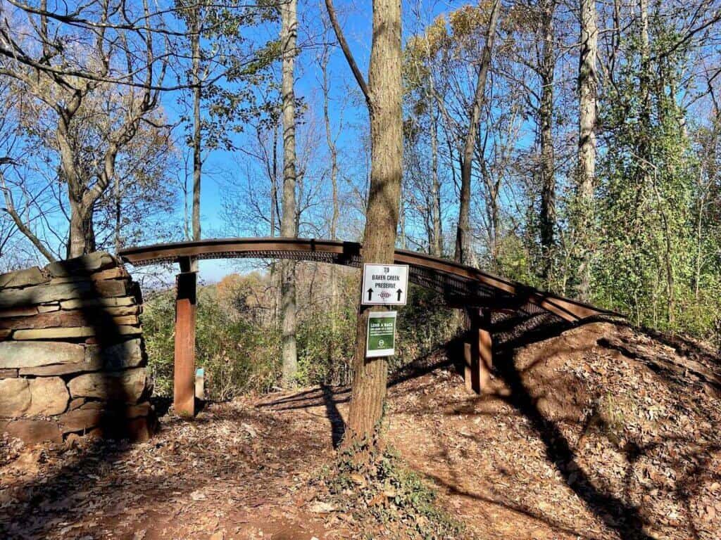 Metal bridge over mountain biking trail at Baker Preserve in Knoxville Tennessee