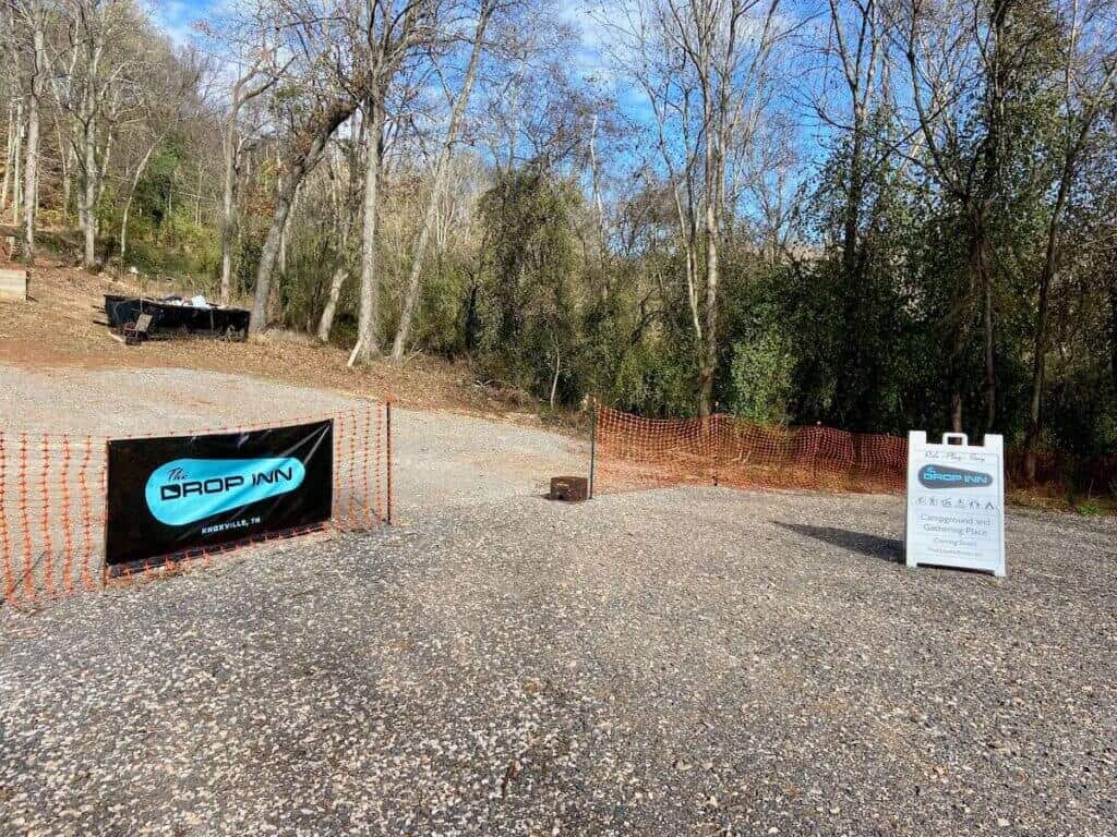 Gravel parking area with signs for Drop Inn at Knoxville Urban Preserve in Tennessee