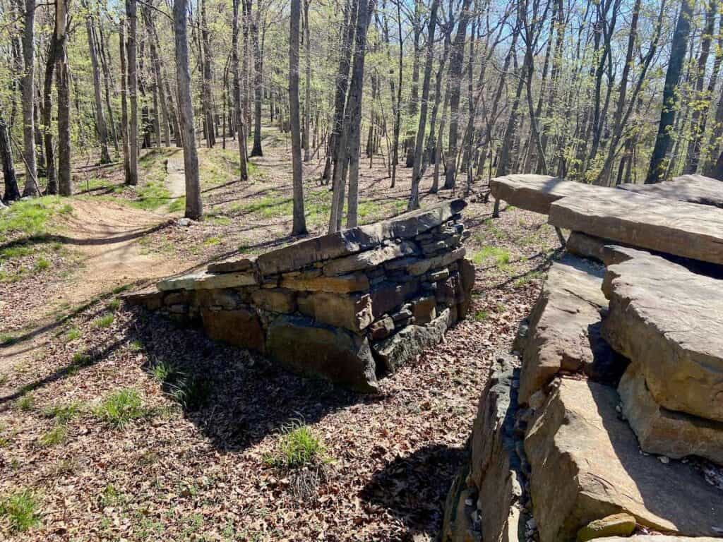 Large rock drop on mountain bike trail at Lake Leatherwood Gravity Project in Arkansas