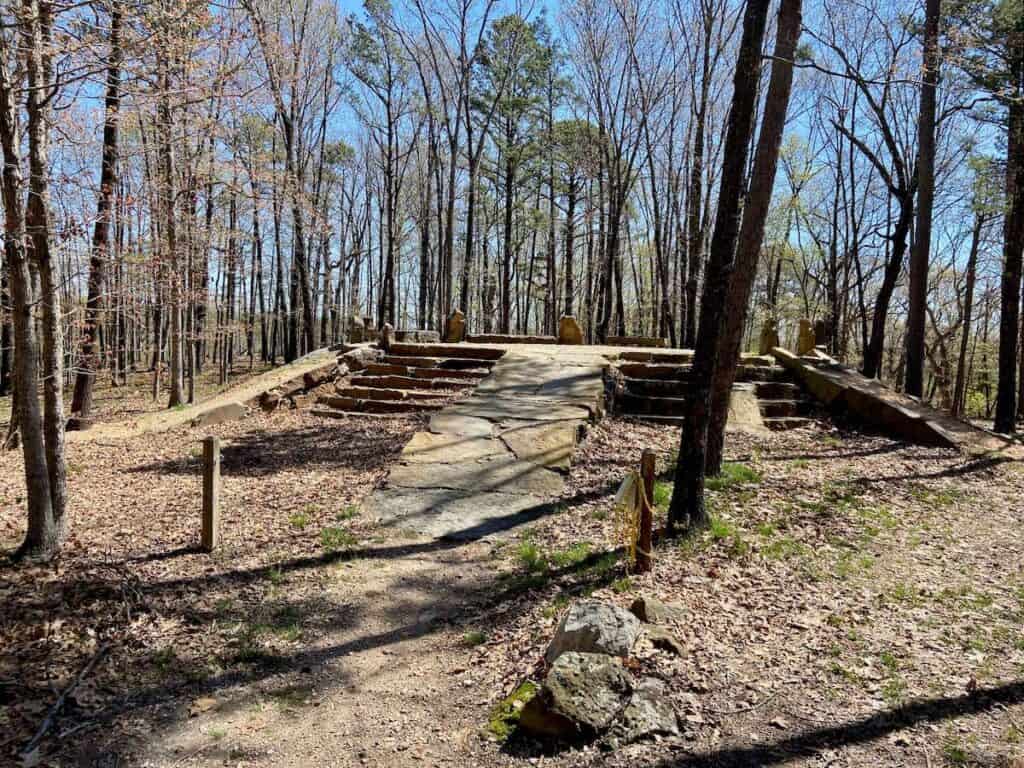 Built-up stone 'hub' that leads into 7 downhill mountain bike trails at Lake Leatherwood Gravity Project in Arkansas