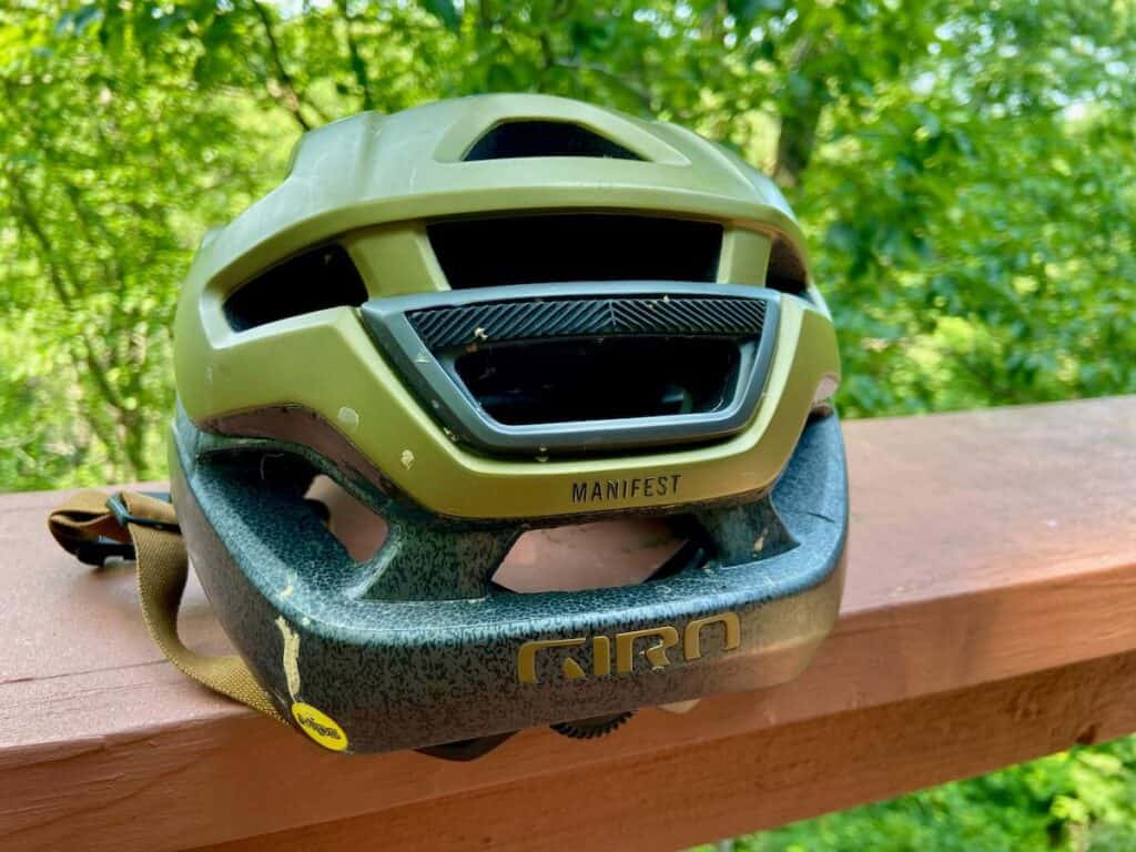 Back of Giro Manifest mountain bike helmet showing strip of rubber to prevent goggle strap from slipped