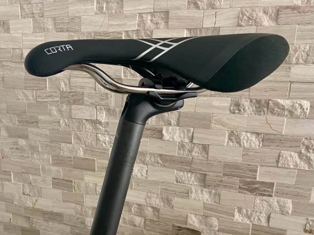 Close up image of bicycle saddle on seat post