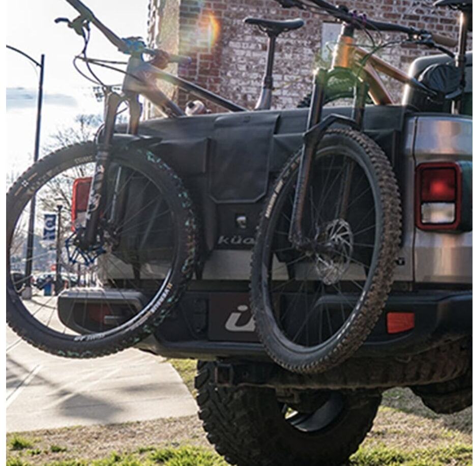 a truck with bicycles on the back