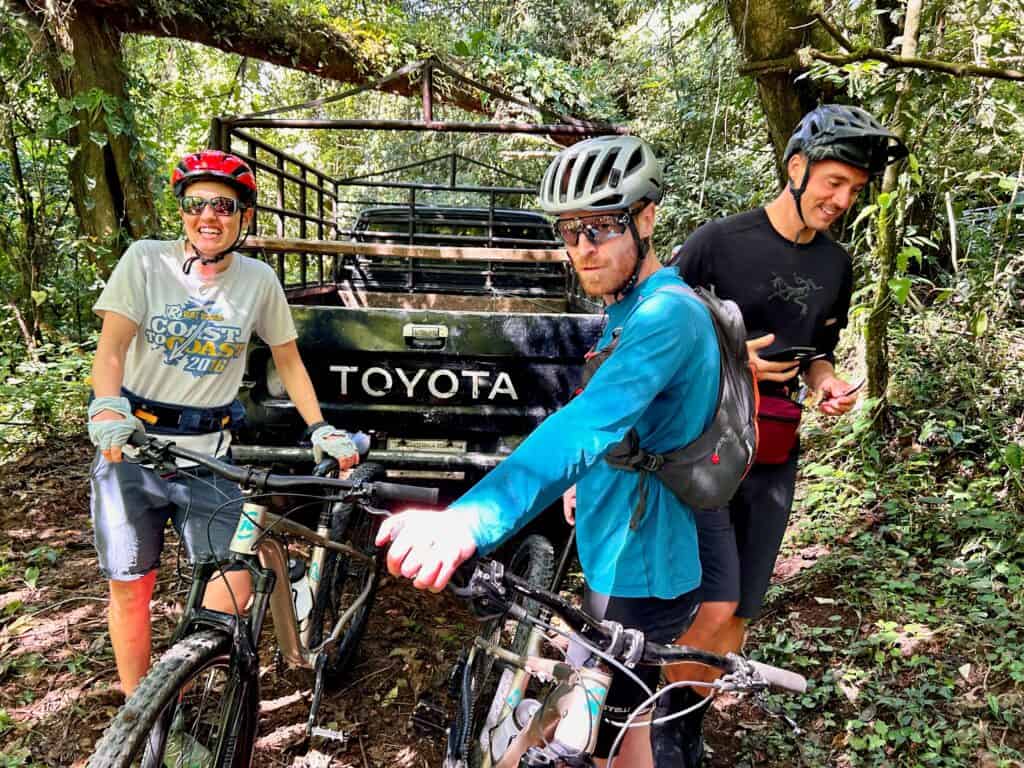 Three mountain bikers getting ready for a ride in Guatemala